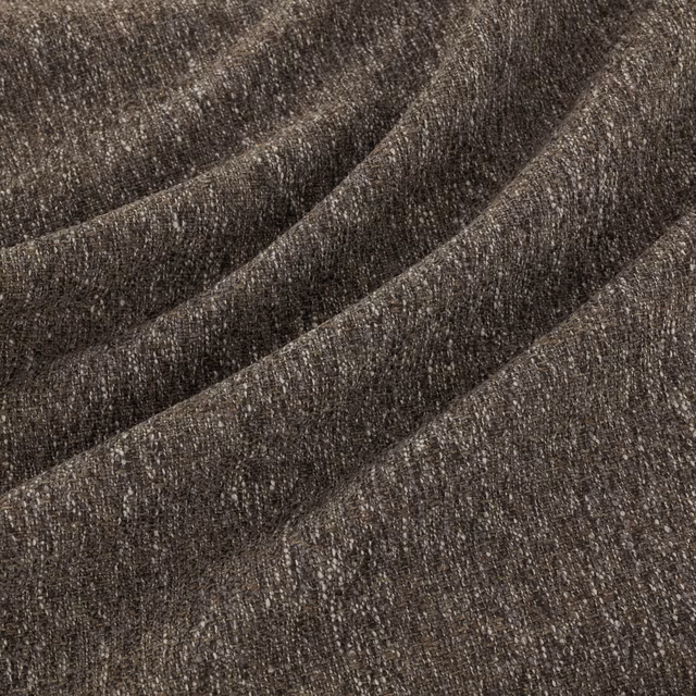 Dark chocolate-brown woven textile showing irregular grain across folded tonal bands