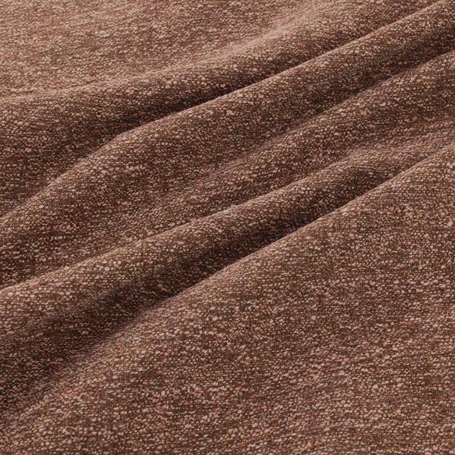 Deep plum-brown nubby woven fabric gathered in soft diagonal folds