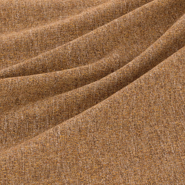 Warm ochre-brown woven fabric with fine crosshatch texture and soft draped folds