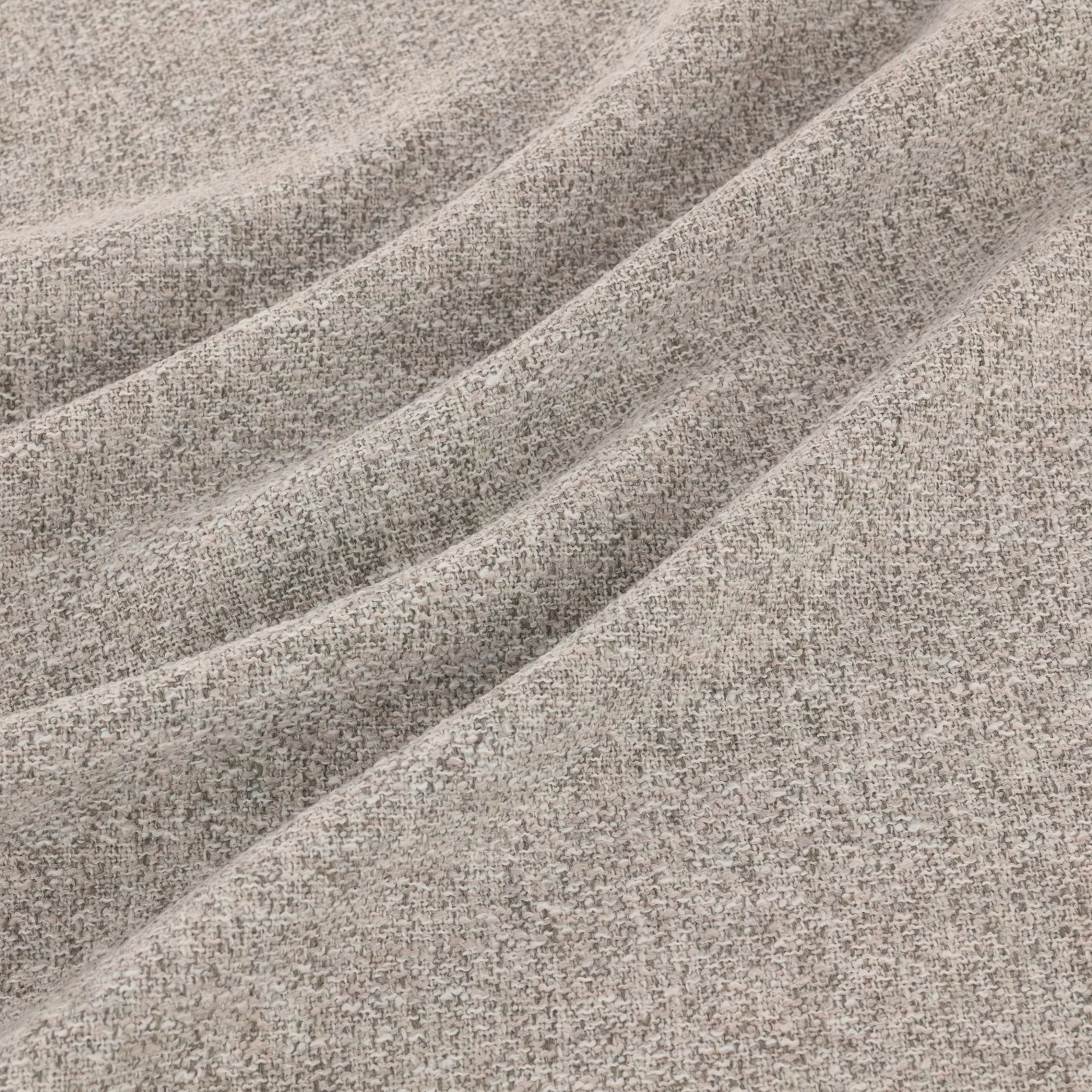Silver-grey fabric with fine mottled weave gathered into broad diagonal folds