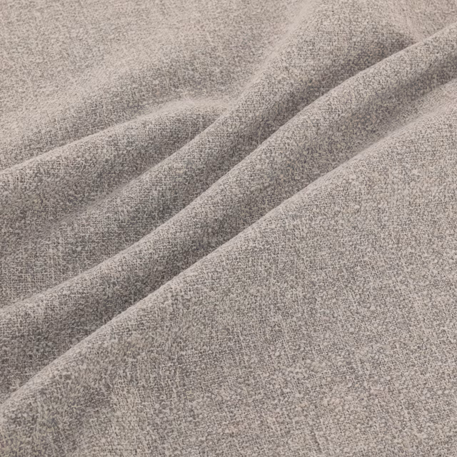 Muted zinc-grey woven fabric with fine mottling shown in soft diagonal folds