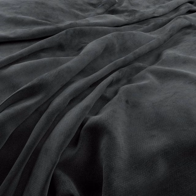 Flowing charcoal blue-grey fabric folds with a fine, subtly grained surface
