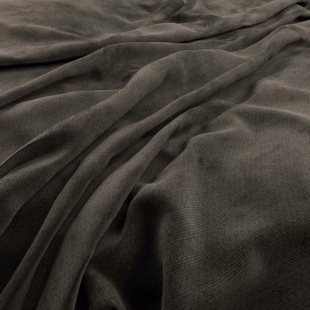 Deep woodland olive fabric showing fine weave and softly gathered flowing folds