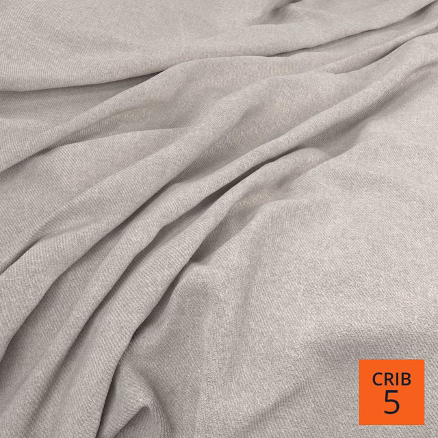 Pale warm-greige woven fabric with soft fleece texture and flowing folds