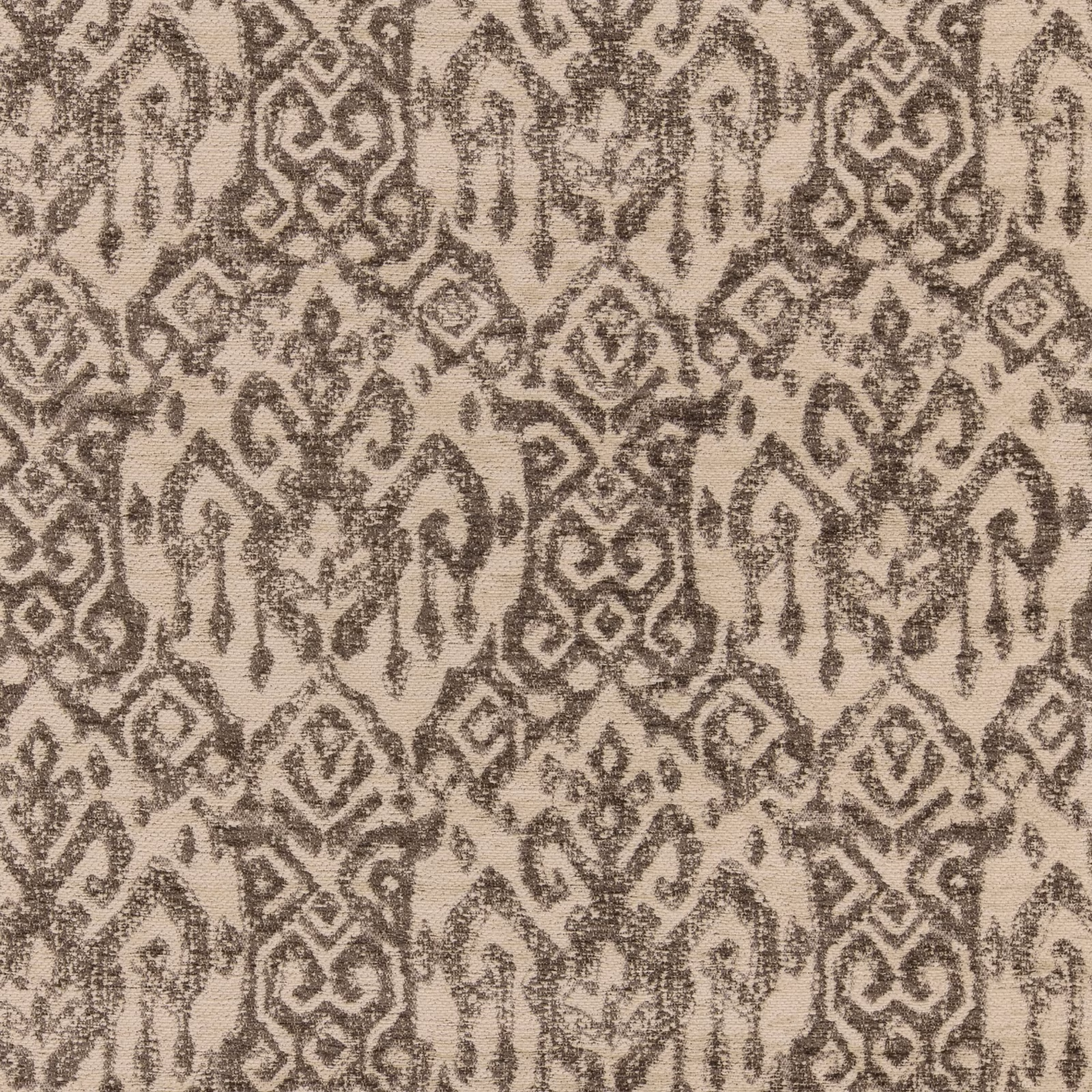 Charcoal and warm stone-beige woven fabric with repeating ornate geometric motifs