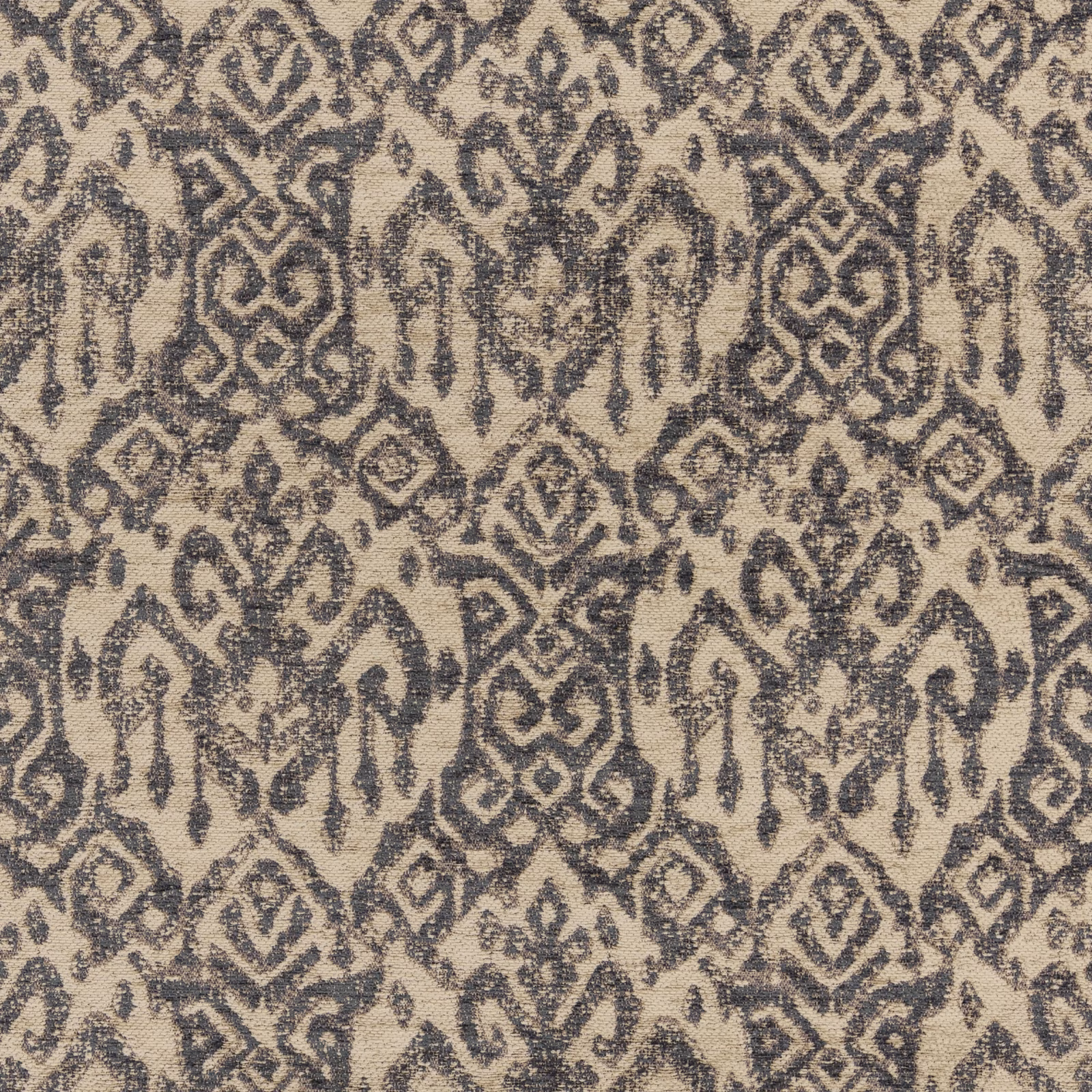 Textured beige fabric with repeating deep indigo damask motifs and geometric medallions
