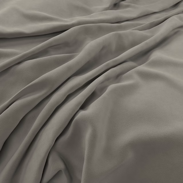 Muted greige-grey velvet with plush nap, soft sheen and deep draped folds