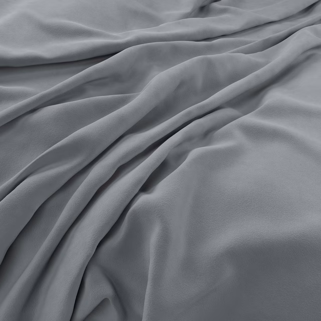 Cool harbour blue-grey velvet with soft pile and sculptural draped folds