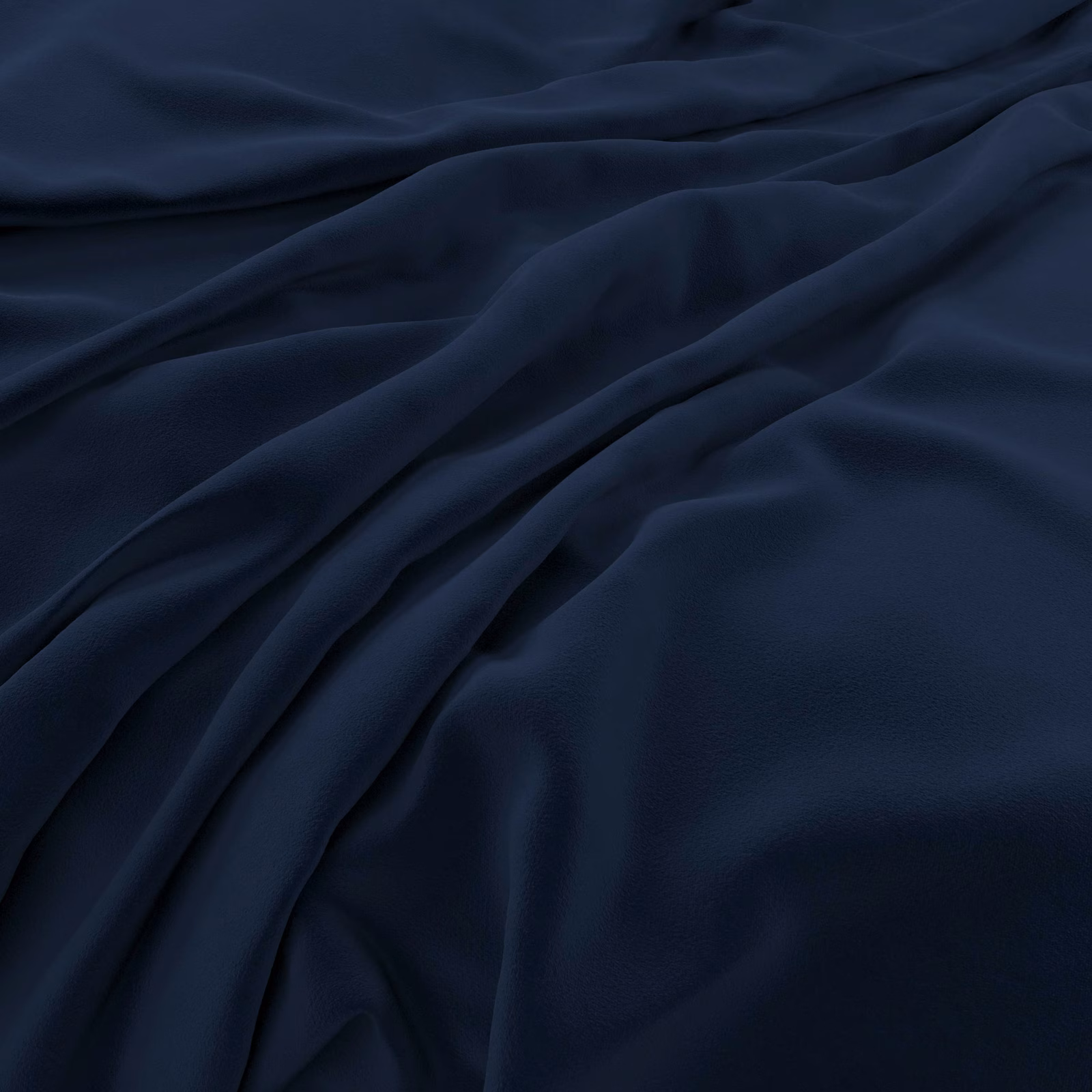 Deep indigo velvet with soft sheen gathered into flowing sculptural folds