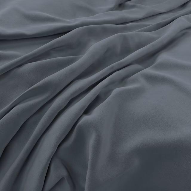 Deep slate blue-grey velvet with soft highlights gathered into flowing folds