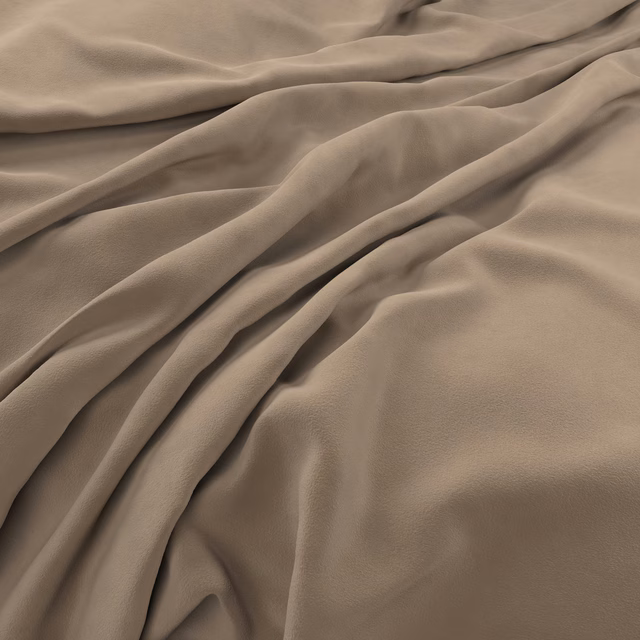 Warm platinum-taupe velvet with soft sheen gathered into deep flowing folds