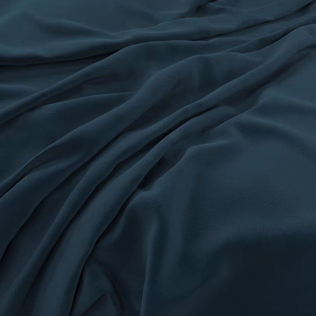 Deep blue-teal velvet draped in folds with subtle ink-dark and blue-green highlights