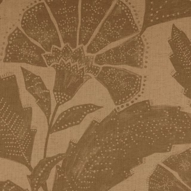 Clay-brown woven fabric with large dotted botanical leaves in tonal umber shades