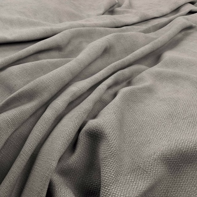 Cool cloudy-grey woven fabric with a fine pebbled texture gathered into soft folds