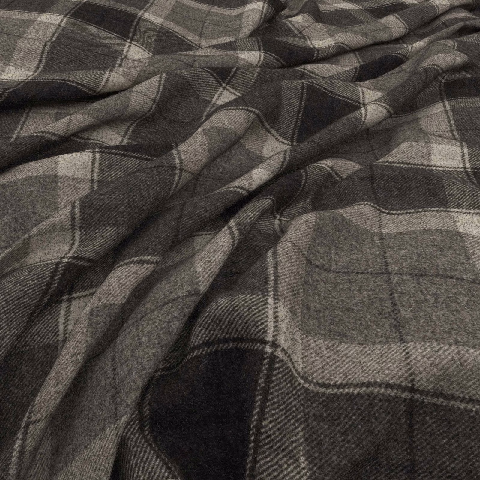 Charcoal grey marl plaid with fine woven texture across a softly folded fabric swatch
