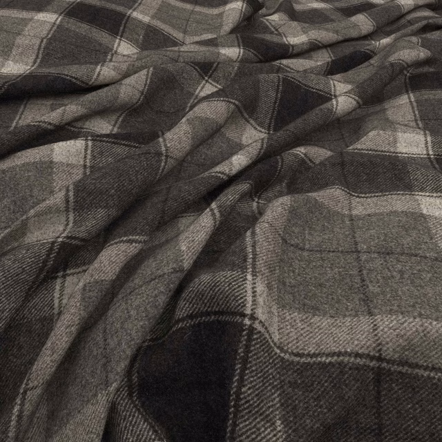 Charcoal grey marl plaid with fine woven texture across a softly folded fabric swatch