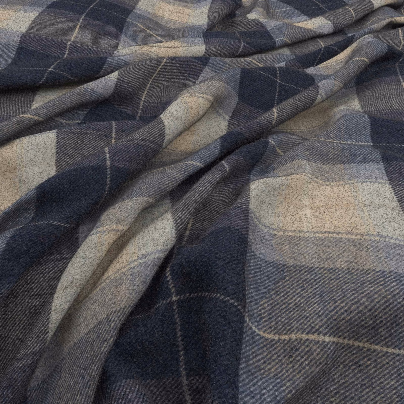 Close-up of Eltham Navy showing navy and grey oversized check with diagonal weave