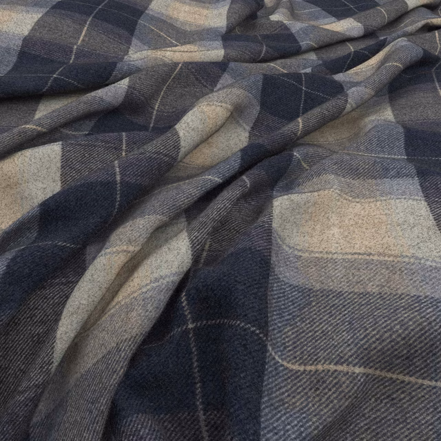 Close-up of Eltham Navy showing navy and grey oversized check with diagonal weave