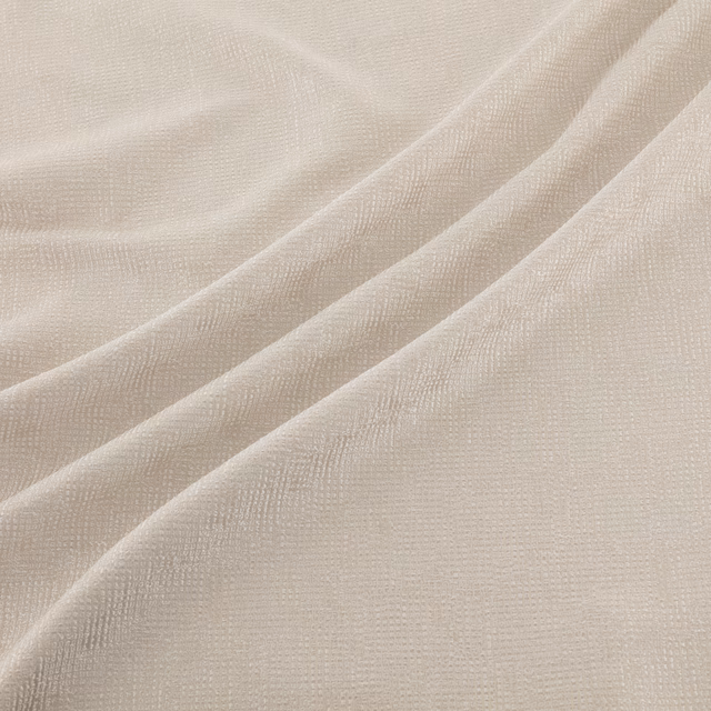 Pale warm ivory fabric with fine woven grid texture and soft draped folds