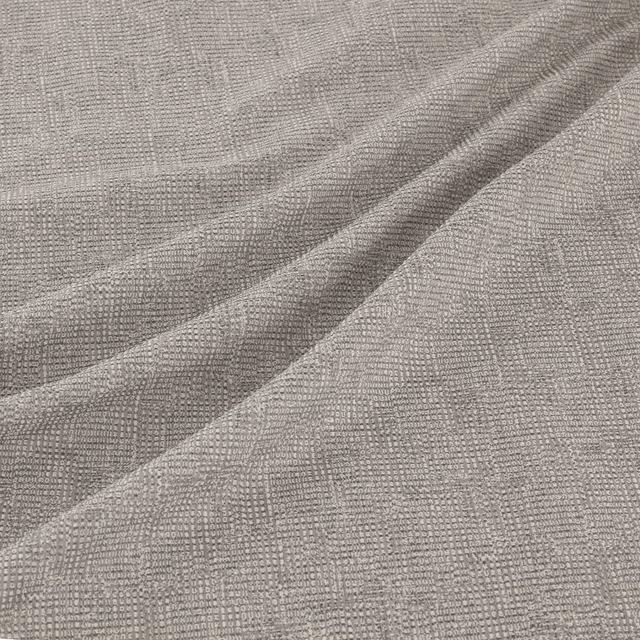 Cool steel-grey woven textile with fine grid texture and soft diagonal folds