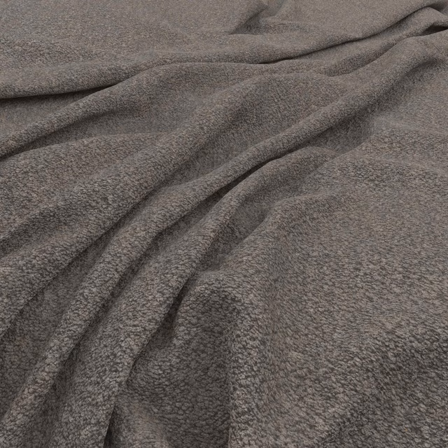Close view of cool steel-grey fabric with dense mottled texture and soft folds