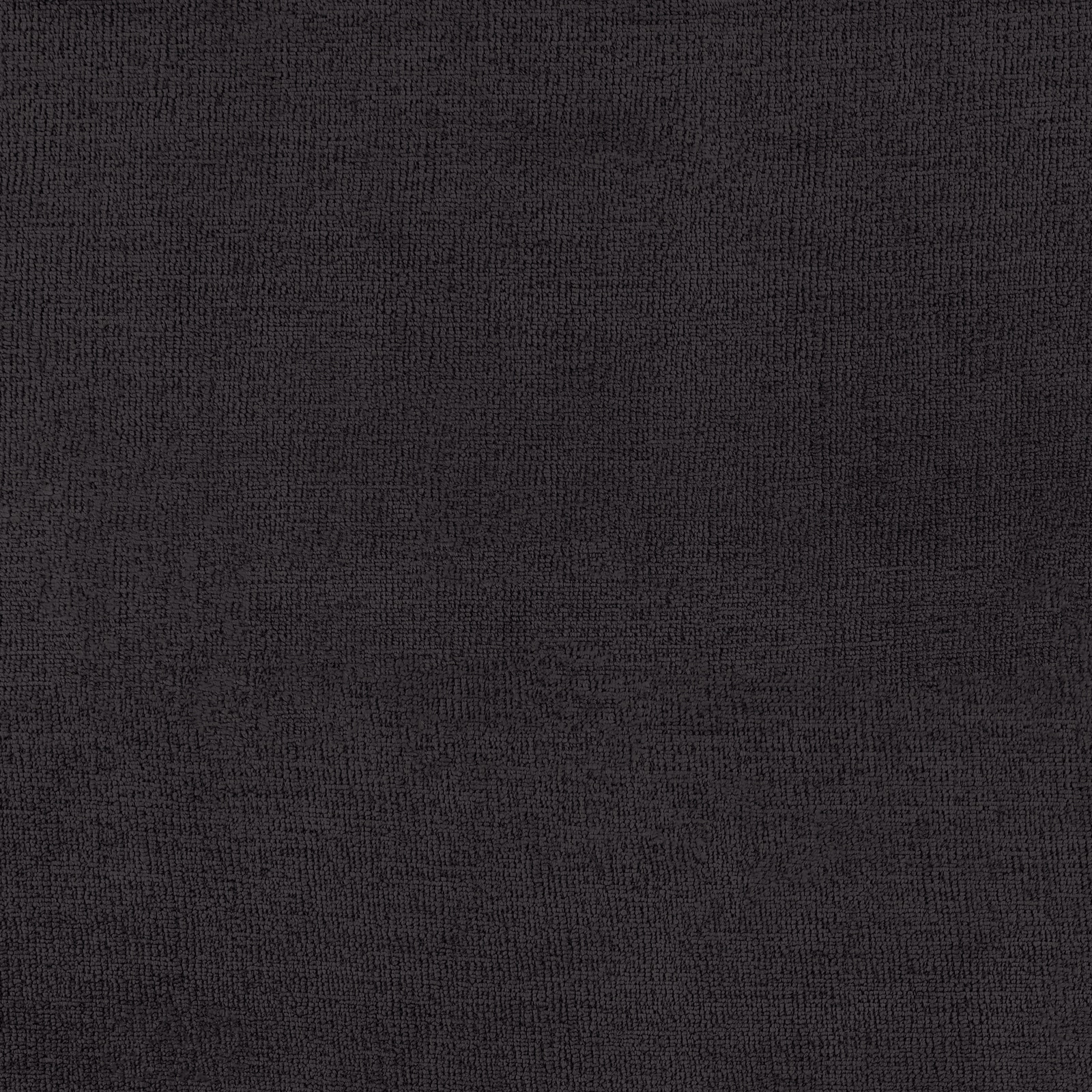 Close-up of deep charcoal-black plain woven upholstery fabric with a fine, matte texture