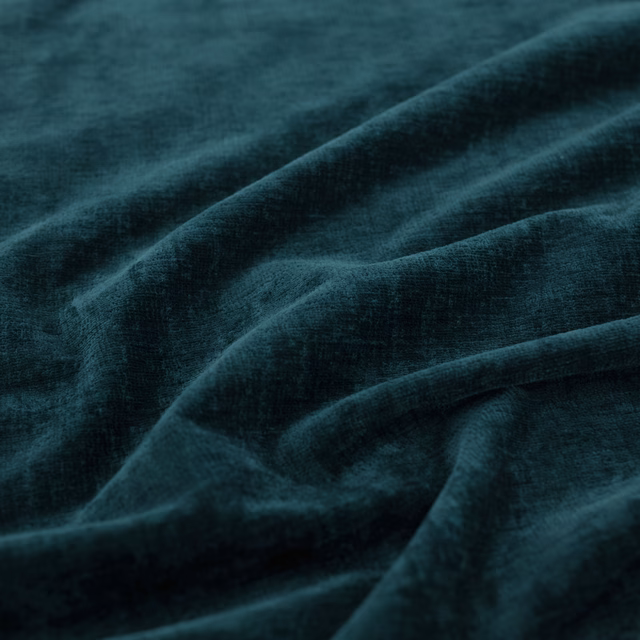 Deep Prussian teal plain upholstery fabric with soft brushed texture and folded drape