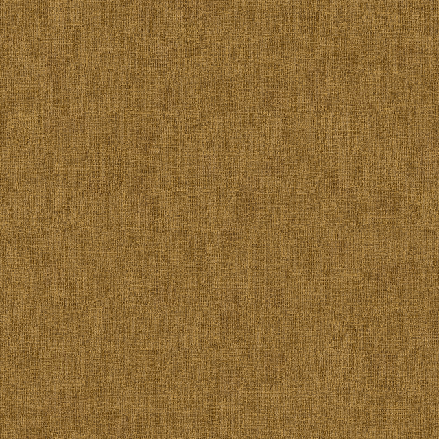 Close-up of warm tobacco-gold plain woven upholstery fabric with fine texture