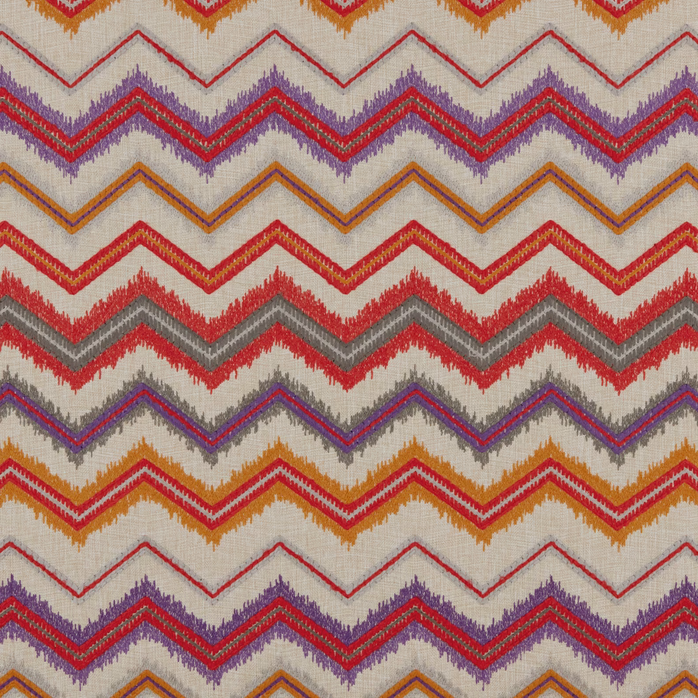 Warm cream fabric with vivid red, purple, ochre and grey woven chevrons