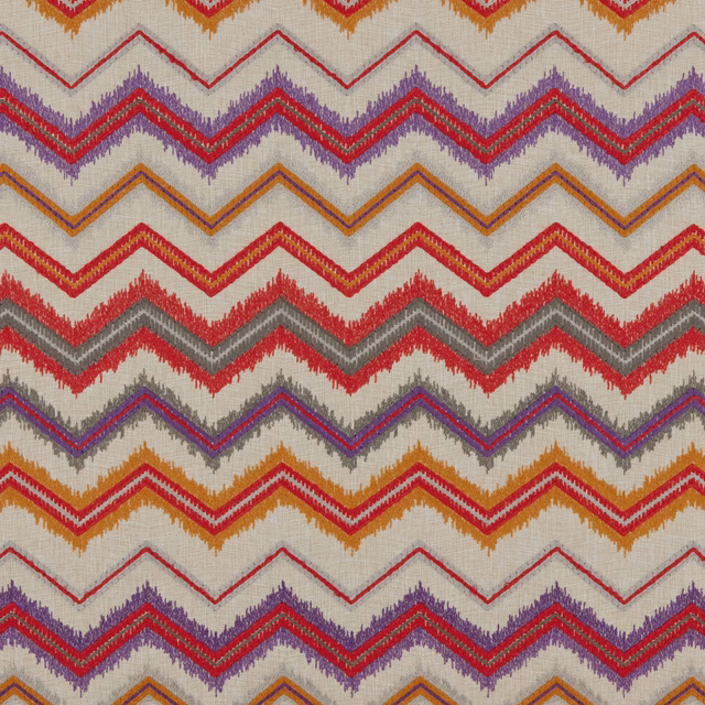 Warm cream fabric with vivid red, purple, ochre and grey woven chevrons