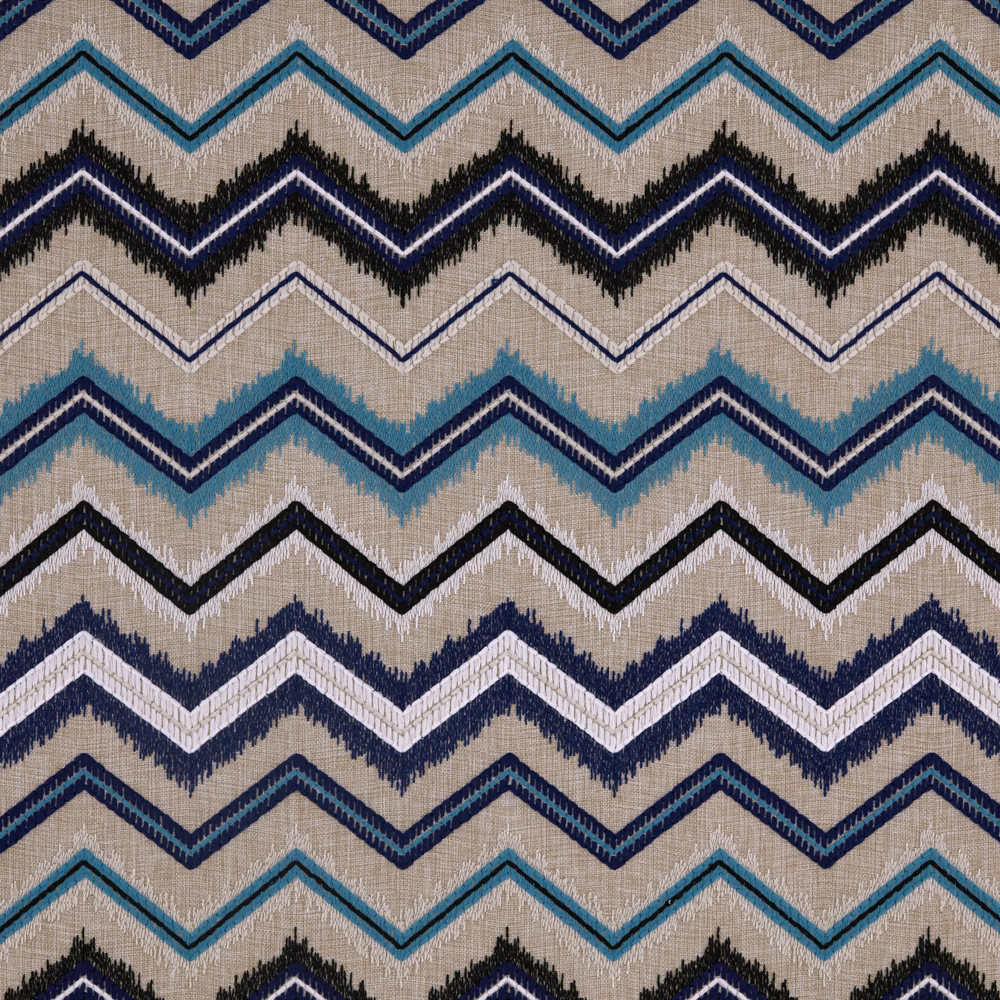 Warm beige woven fabric with navy, turquoise and black zigzag bands
