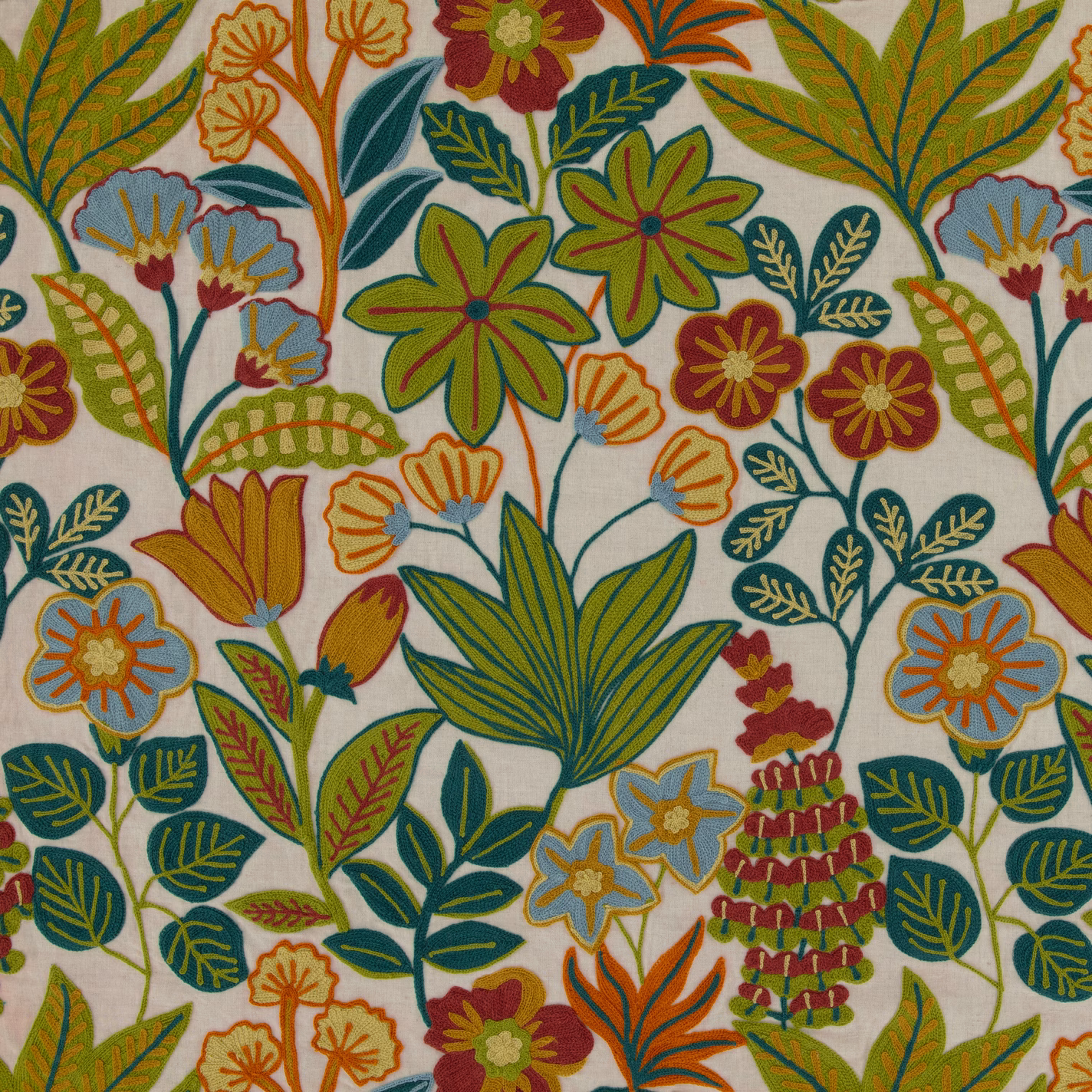 Warm ivory botanical textile with olive leaves, teal foliage, and rust flowers
