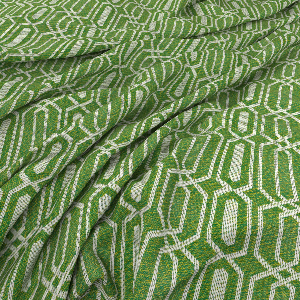 Bright apple-green textile with ivory linked polygon lines and a softly textured weave