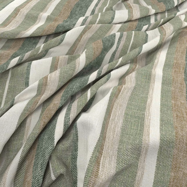 Muted clover sage fabric with cream, taupe and grey wavering stripes in folds
