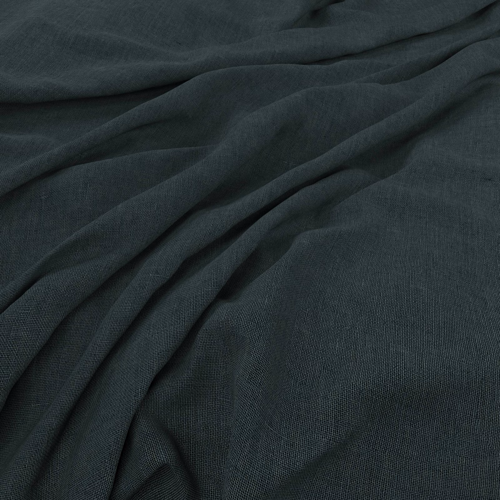 Deep kingfisher teal fabric with fine plain weave falling into soft folds