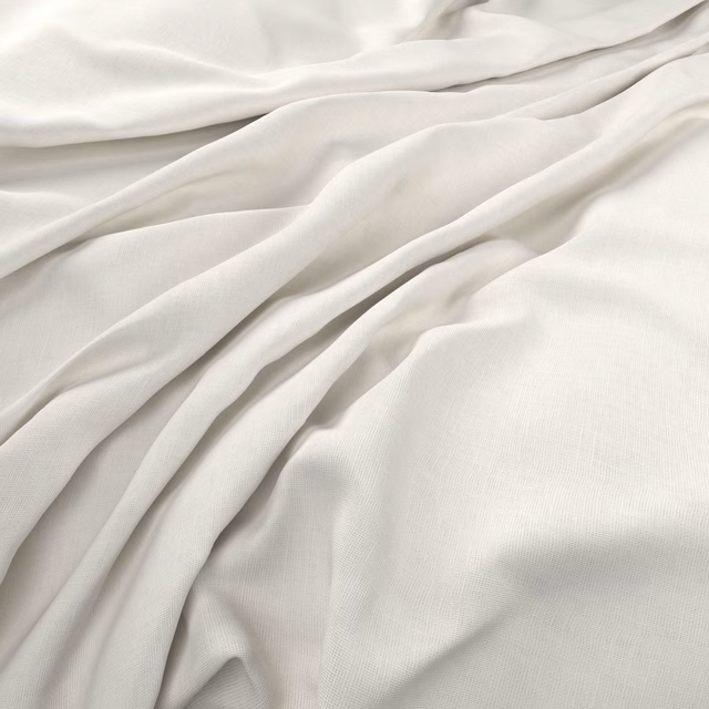 Warm milk-white plain weave fabric gathered into soft, fluid folds