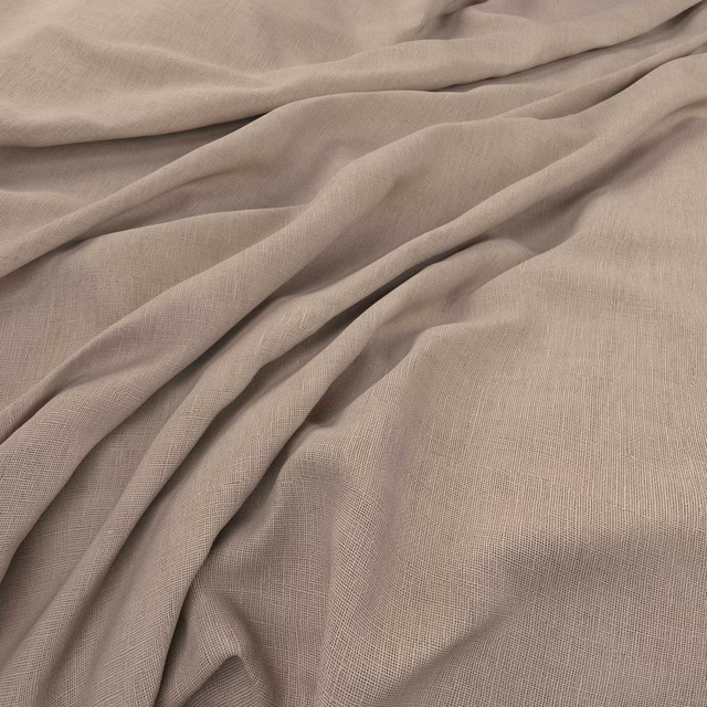 Muted oyster-taupe woven fabric falling in soft, finely textured folds