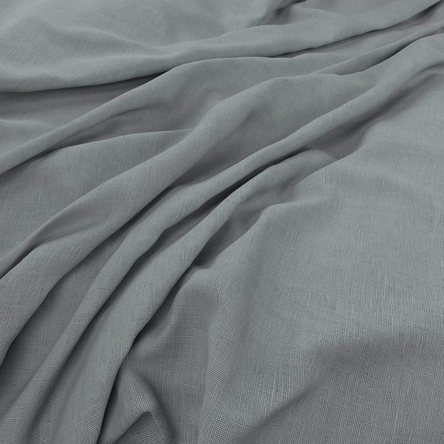 Misty blue-grey fabric with fine plain weave gathered into soft flowing folds