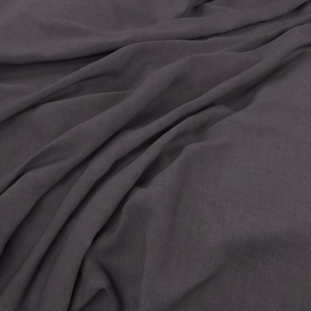 Dark storm-grey Flanders fabric showing a fine weave in soft, fluid folds