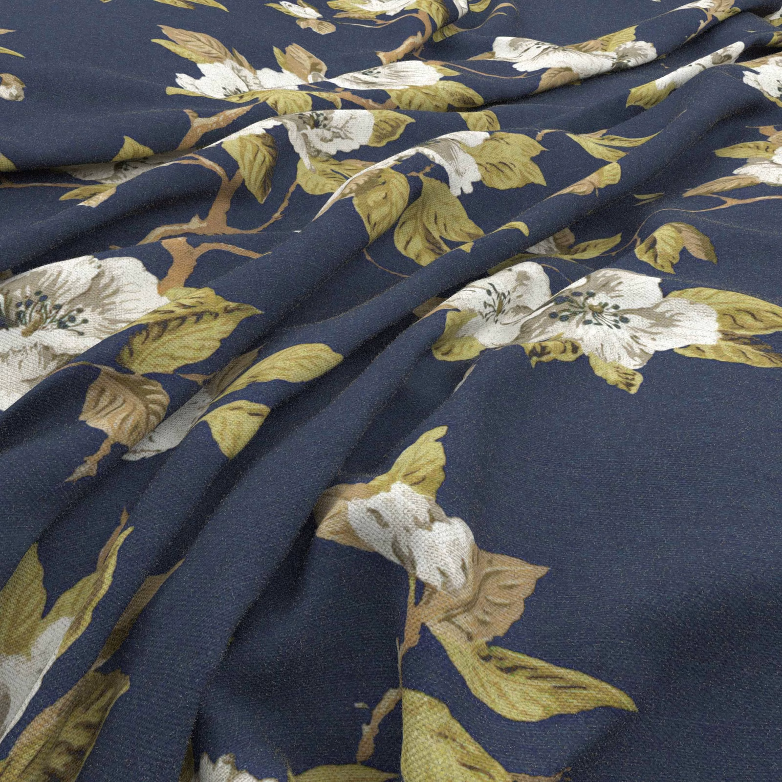 Deep denim-blue fabric with large cream flowers and muted olive leaves in soft folds