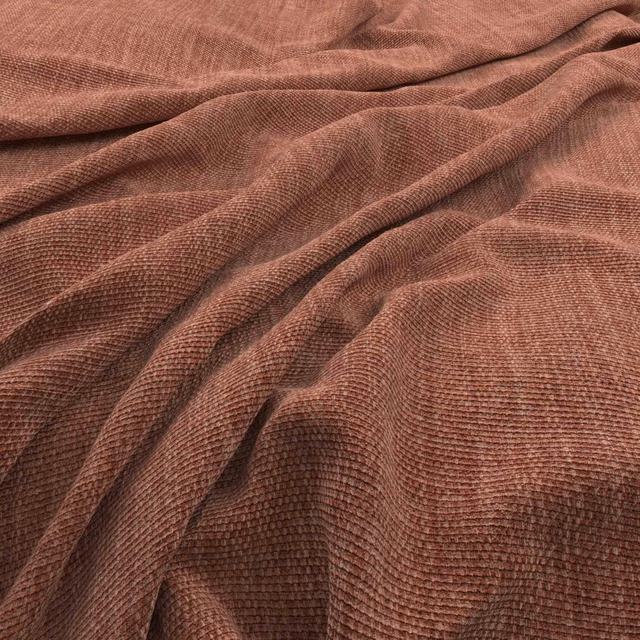 Warm brick-brown ribbed weave draped in soft, dimensional folds