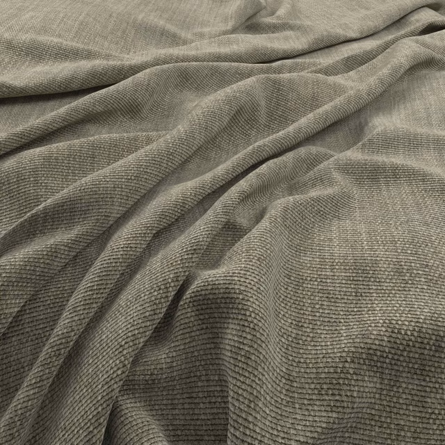 Muted eucalyptus-green ribbed fabric gathered into soft, shadowed folds