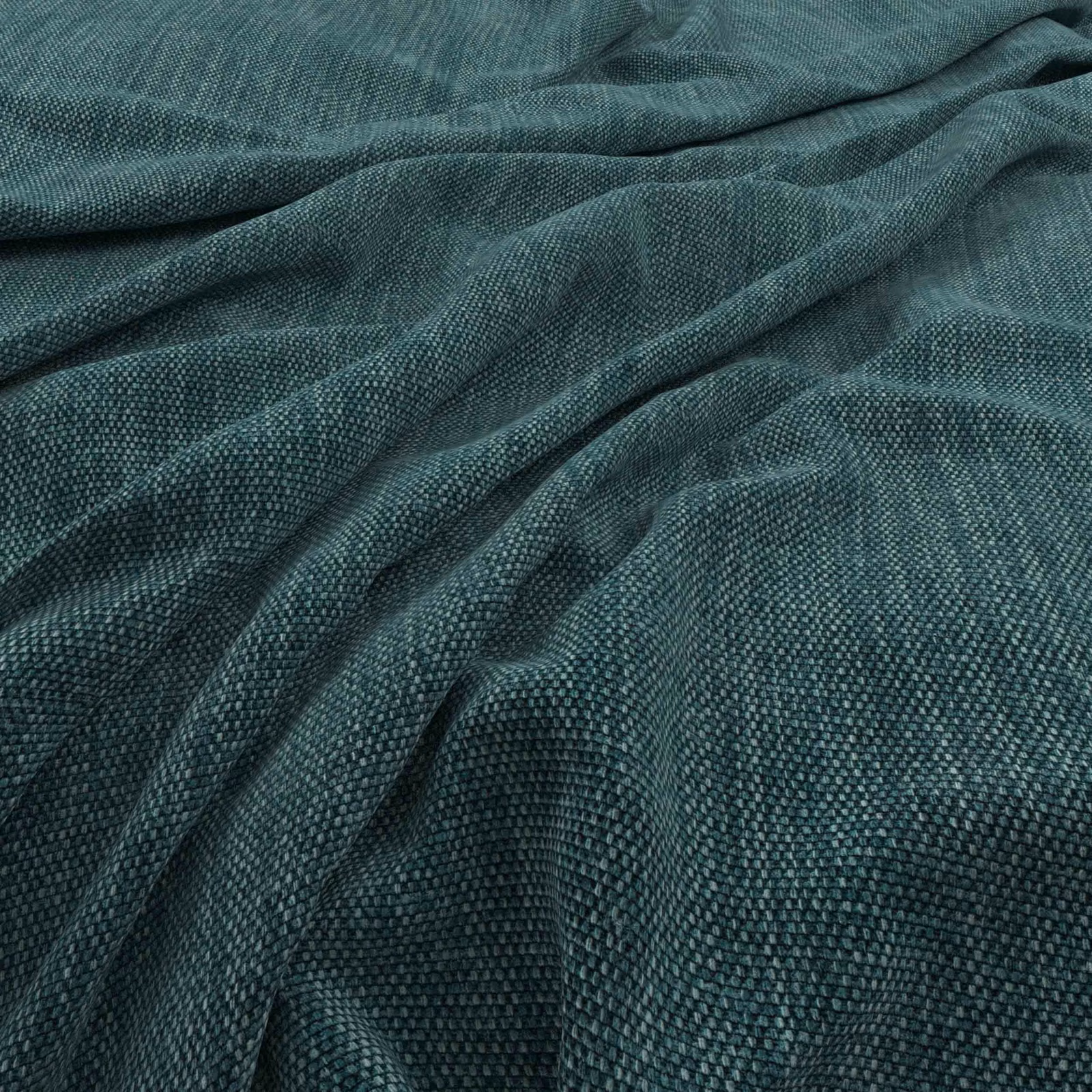 Deep mallard teal fabric with dense nubby weave draped into soft folds