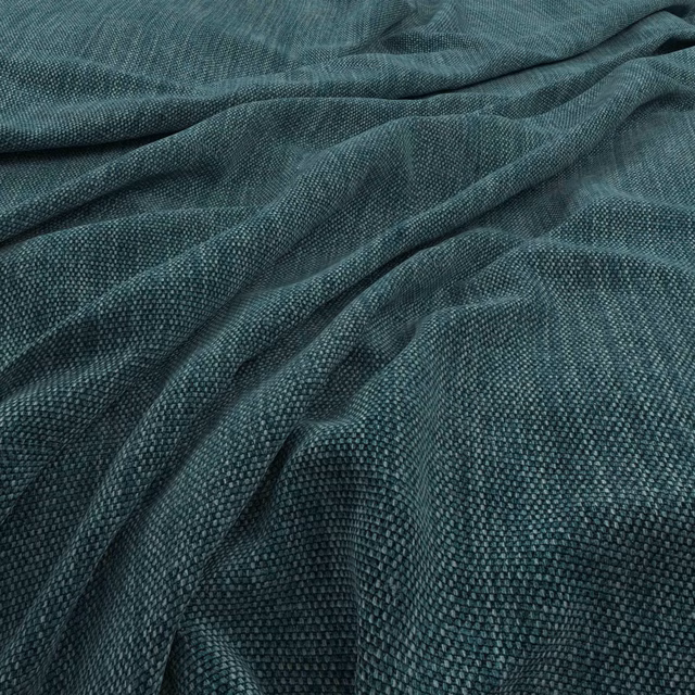 Deep mallard teal fabric with dense nubby weave draped into soft folds