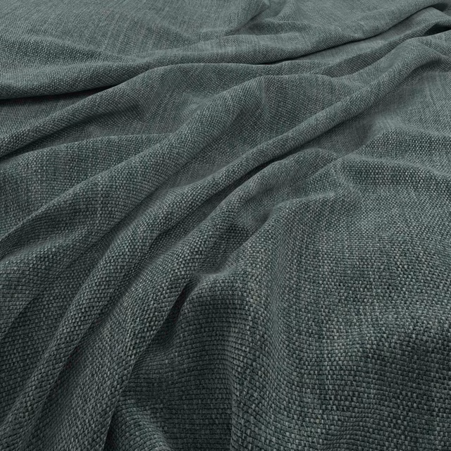Deep spruce blue-green fabric with a fine pebbled weave draped in soft folds
