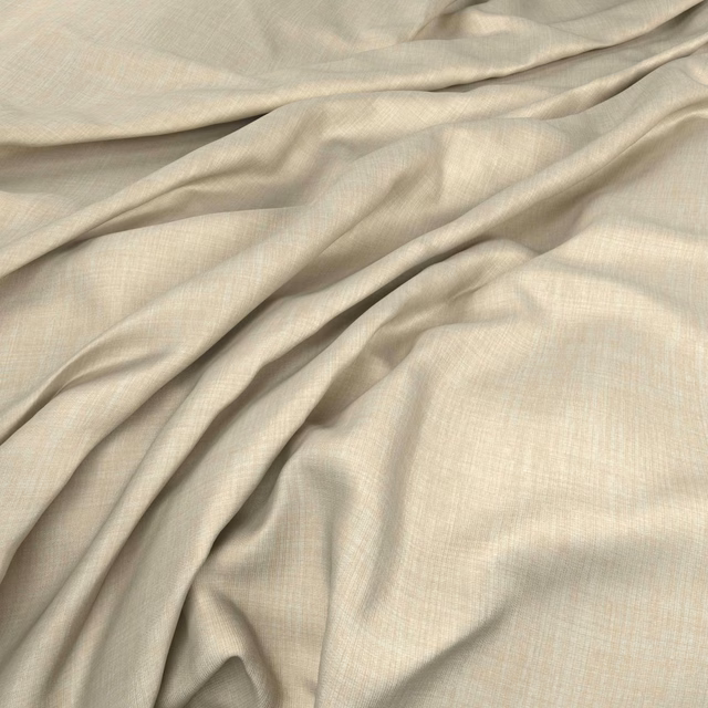 Warm cream crosshatched fabric gathered into soft, fluid folds with subtle ivory shading