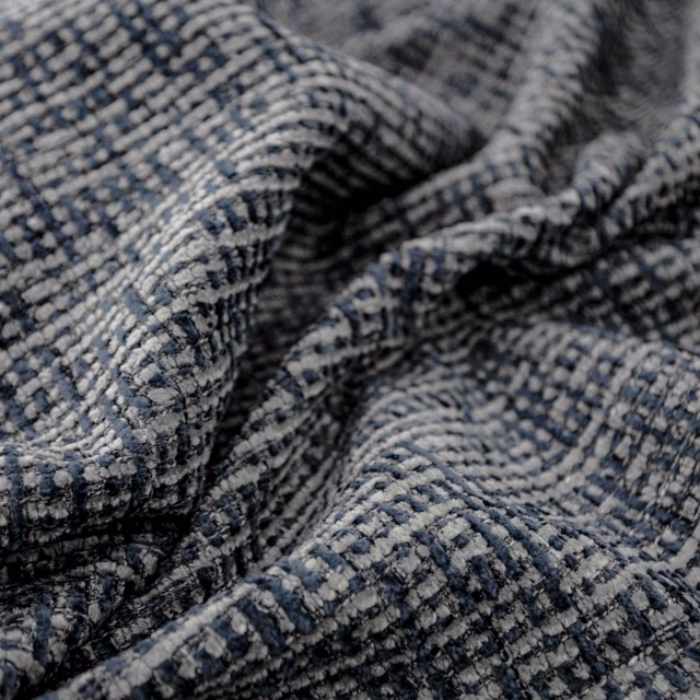 Nubby denim-blue upholstery weave with charcoal flecks and pale grey broken checks