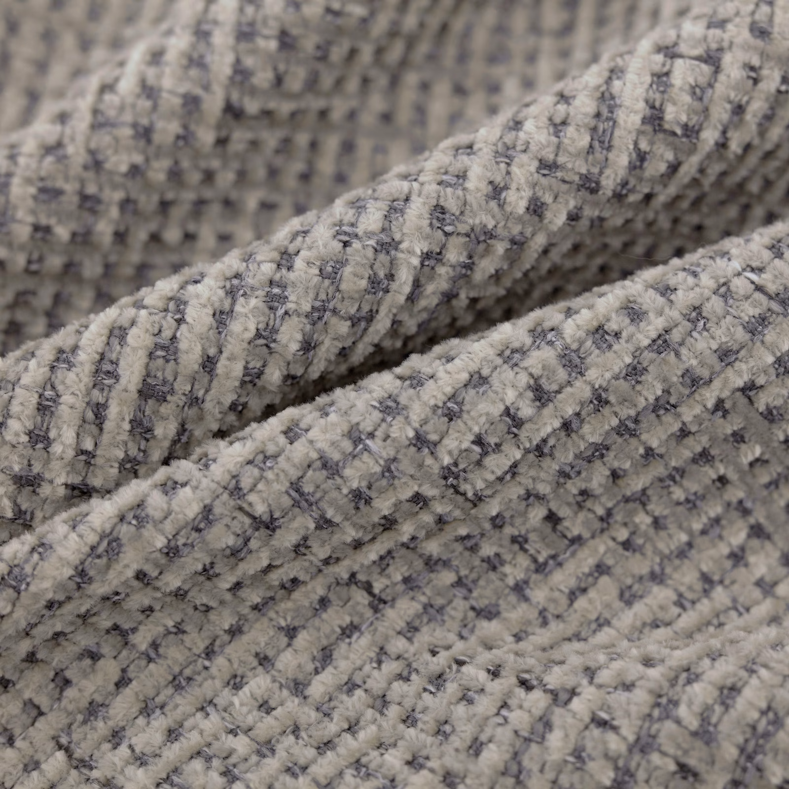 Stone-grey Gabba textile with charcoal broken grid and raised nubby weave