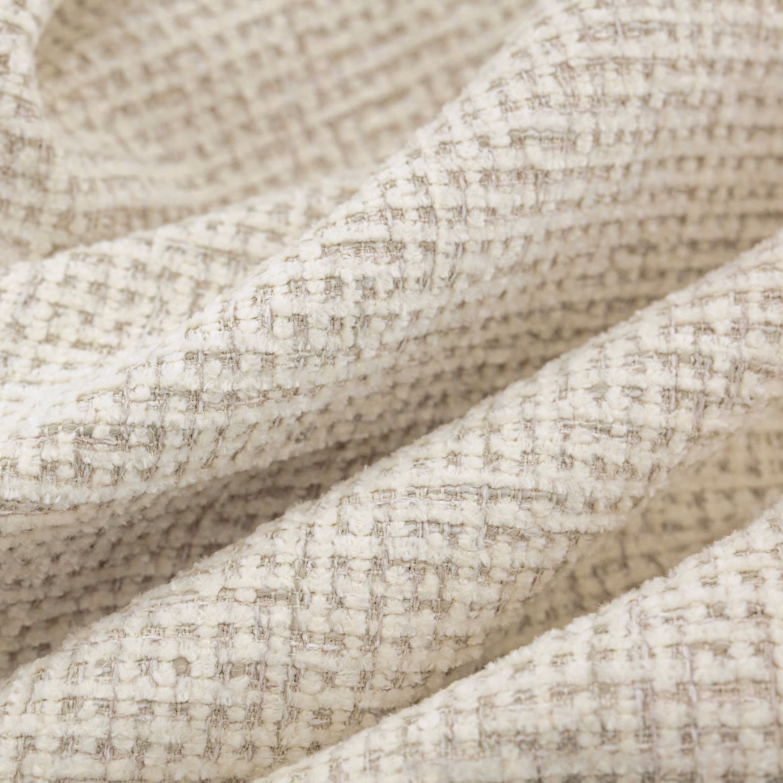 Warm ivory woven swatch with taupe flecks and raised nubby texture