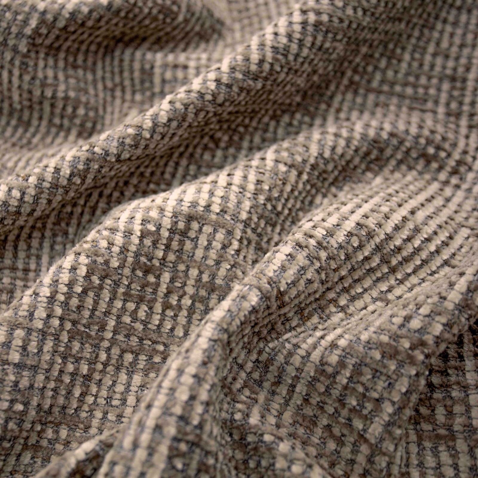 Warm latte and taupe small-check weave gathered in soft, textured folds